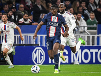 Nordi MUKIELE of PSG and Moussa DEMBELE of Lyon during the French championship Ligue 1 football match between Olympique Lyonnais and Paris S...