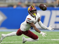 Washington Commanders wide receiver Terry McLaurin (17) catches the ball during the second half of an NFL football game against the Detroit...