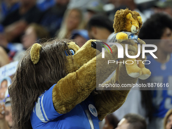 Detroit Lions mascot Roary lifts up a cub during the Lions Cub Cam during an NFL football game between the Detroit Lions and the Washington...
