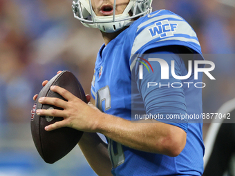 Quarterback Jared Goff (16) of the Detroit Lions looks to pass the ball to wide receiver Josh Reynolds (8) of the Detroit Lions during an NF...
