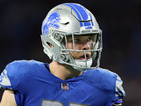 defensive end Aidan Hutchinson (97) of the Detroit Lions looks over the field during an NFL football game between the Detroit Lions and the...