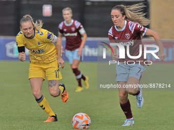  Lisa Evans (on loan from Arsenal) of West Ham United WFC takes on Lucy Graham of Everton during Barclays Women's Super League match between...