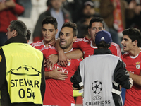 Benfica's forward Jonas (C) celebrates his goal with his teammates during the Champions League  football match between SL Benfica and Galata...