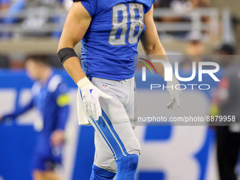 Tight end T.J. Hockenson (88) of the Detroit Lions walks on the field between plays during an NFL football game between the Detroit Lions an...