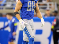 Tight end T.J. Hockenson (88) of the Detroit Lions walks on the field between plays during an NFL football game between the Detroit Lions an...