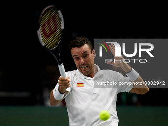 Roberto Bautista Agut of Spain in action against Vasek Pospisil of Canada during the Davis Cup Finals Group B Stage Men's Singles match betw...