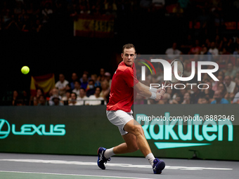 Vasek Pospisil of Canada in action against Roberto Bautista Agut of Spain during the Davis Cup Finals Group B Stage Men's Singles match betw...