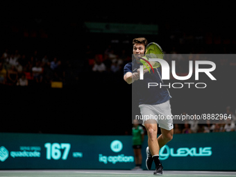 Miomir Kecmanovic of Serbia in action against Felix Auger Aliassime of Canada during the Davis Cup Finals Group B Stage Men's Singles match...