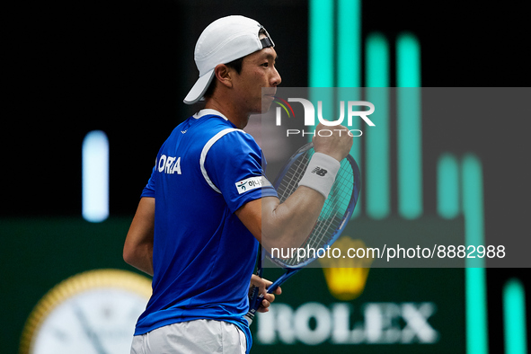 Seong Chan Hong of Republic of Korea celebrates against Roberto Bautista Agut of Spain during the Davis Cup Finals Group B Stage Men's Singl...