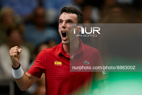 Roberto Bautista Agut of Spain celebrates against Seong Chan Hong of Republic of Korea during the Davis Cup Finals Group B Stage Men's Singl...