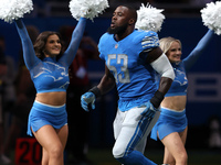 Detroit Lions linebacker Charles Harris (53) is introduced at the beginning of an NFL football game between the Washington Commanders and th...