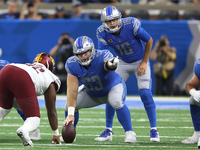 Detroit Lions center Evan Brown (63) points before the snap during the first half of an NFL football game against the Washington Commanders...