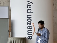 A man walks past an Amazon Pay logo in Global Fintech Fest event in Mumbai, India, 20 September, 2022.  (