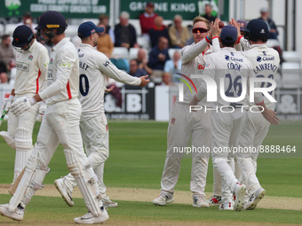 Essex's Simon Harmer celebrates the wicket of George Balderson of Lancashire CCC during LV= COUNTY CHAMPIONSHIP - DIVISION ONE Day One of 4...