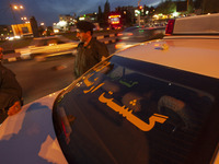 Iranian morality policeman stands guard while monitoring an area in Tehran. Thousands of Iranians protest the death of Mahsa Amini, Also kn...