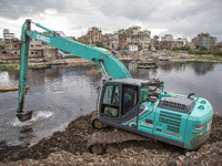 Authority coduct dredging on Buriganga River as the bottom of river is full  of plastic waste in Dhaka on September 20, 2022. (
