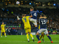 Scott McTominay of Scotland wins a header while Bogdan Mykhaylichenko of Ukraine during the UEFA Nations League match between Scotland and U...