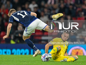 Ukraine's Bogdan Mykhaylichenko tackles Scotland's Stuart Armstrong during the UEFA Nations League match between Scotland and Ukrain...