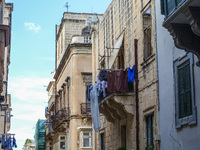 Laundry hanging on the balcony is seen in Valletta, Malta on 21 September 2022  (