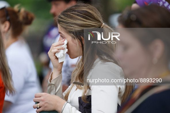 A woman cries while listening to a speaker during a rally near the U.S. Capitol in Washington, D.C. on September 22, 2022 to urge the Senate...