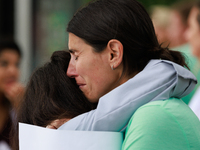 People console each other during a rally near the U.S. Capitol in Washington, D.C. on September 22, 2022 to urge the Senate to pass a federa...