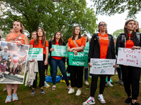 Demonstrators attend a rally demanding the Senate pass an assault weapons ban. The rally featured victims, families, and survivors, as well...