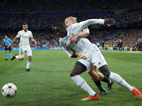 Xaver Schlager central midfield of RB Leipzig and Austria and Ferland Mendy left-back of Real Madrid and France compete for the ball during...