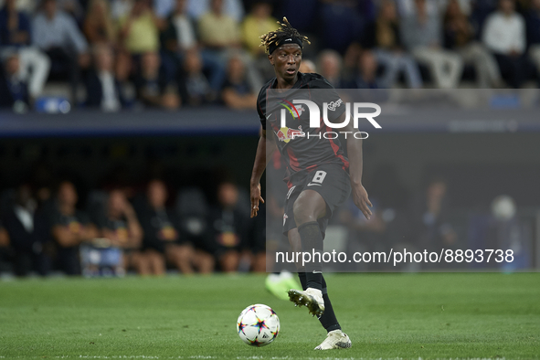 Amadou Haidara central midfield of RB Leipzig and Mali controls the ball during the UEFA Champions League group F match between Real Madrid...