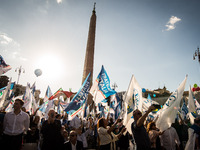 Supporters of the center-right attend a closing rally of the campaign for the general elections at Piazza del Popolo in Rome, Italy, 22 Sept...