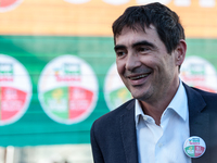 The secretary of Sinistra italiana Nicola Fratoianni attends with a peace flag an event at the end of the election campaign of the Left Gree...