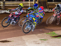 Brady Kurtz  (Yellow) outside Jack Holder  (Blue) and Tobiasz Musielak  (Red) with Norick Blodorn  (White) ayt the rear during the SGB Premi...