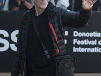 Actor David Cronenberg waves upon his arrival at the San Sebastian Festival to present the film 'Crimes of the Future', on September 20, 202...