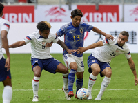 Hidemasa Morita defensive midfield of Japan and Sporting CP surronded by USA players during the international friendly match between Japan a...