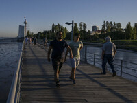 People are seen walking around the walkway of the Vasco da Gama bridge, Lisbon. September 22, 2022. (