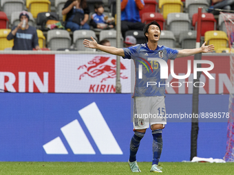 Daichi Kamada attacking midfield of Japan and Eintracht Frankfurt celebrates after scoring his sides first goal during the international fri...