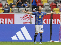 Daichi Kamada attacking midfield of Japan and Eintracht Frankfurt celebrates after scoring his sides first goal during the international fri...