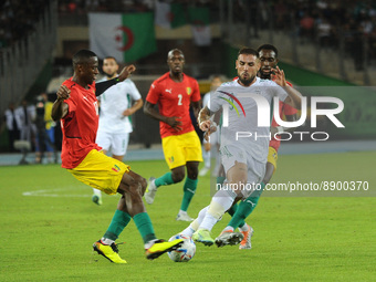 Andy Delort (R) of Algeria vies for the ball, during Friendly Match Between Algeria and Guinea at the Stade d'Oran in Algeria on September 2...