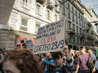 A poster displayed by a student denounces the total insensitivity of politicians to environmental and climate issues.
Milan, 23 September 2...