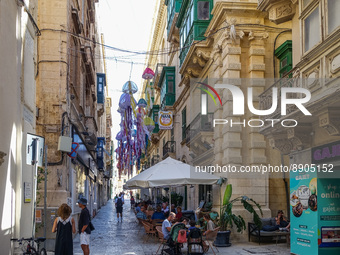 General view of the old town residential area street with a seaview is seen in Valletta, Malta on 21 September 2022  (