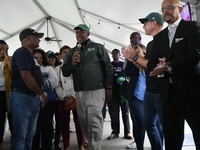 Congressman Dwight Evans introduces Pennsylvania Attorney General Josh Shapiro during the halftime break of an Eagles watch party, in Philad...