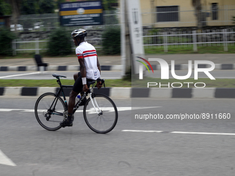 A man rides backward during the Lagos State Government 2022 World Car Free Day held at Alausa, Ikeja, Lagos, Nigeria on Sunday, September 25...