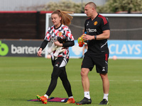 DAGENHAM ENGLAND - SEPTEMBER  25 :Sophie Baggaley of Manchester United Women and Ian Wilcock Goalkeeping Coach of Manchester United Women...