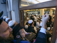 Orthodox Jewish pilgrims celebrate near the tomb of Rabbi Nachman while celebrating Rosh Hashanah, the Jewish New Year,  amid Russia continu...
