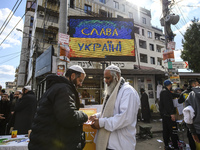 Orthodox Jewish pilgrims on the street near the tomb of Rabbi Nachman while celebrating Rosh Hashanah, the Jewish New Year,  amid Russia con...