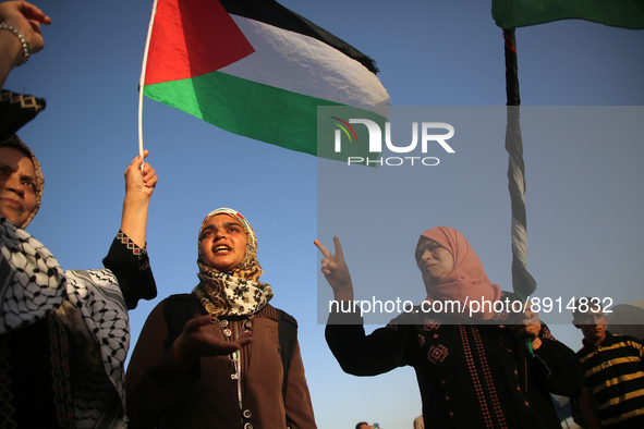 Palestinians gather during a demonstration in support of the Al-Aqsa mosque next to the border fence with Israel, east of Gaza City, on Sept...