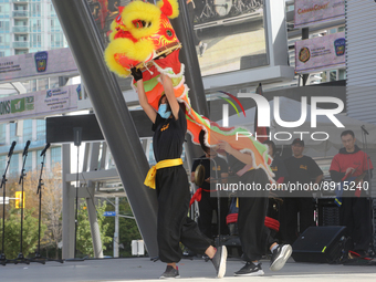 Chinese dancers perform a traditional Lion Dance during the Community Crime Awareness Day in Mississauga, Ontario, Canada, on September 26,...