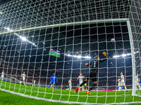 Goalkeeper of Hungary Peter Gulacsi saves during the UEFA Nations League A3 match at Puskás Aréna on Sept 26, 2022 in Budapest, Hungary. (