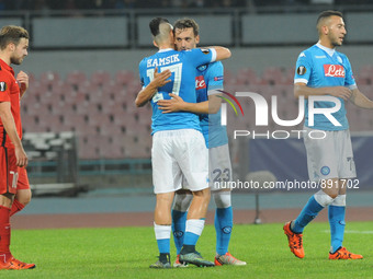 Manolo Gabbiadini of SSC Napoli celebrates with team mates after scoring during UEFA Europa League Group D match between SSC Napoli and FC M...