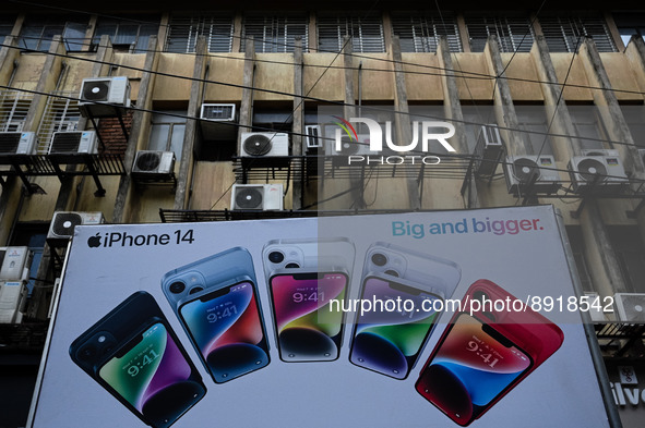 An iphone 14 advertisement is seen at a billboard in Kolkata on September 27, 2022. Apple Inc. said on Monday it will manufacture its latest...