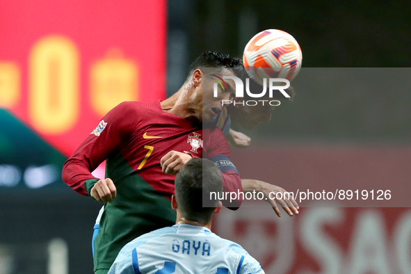 Cristiano Ronaldo of Portugal (L) vies with Pau Torres of Spain during the UEFA Nations League Group A2 football match between Portugal and...